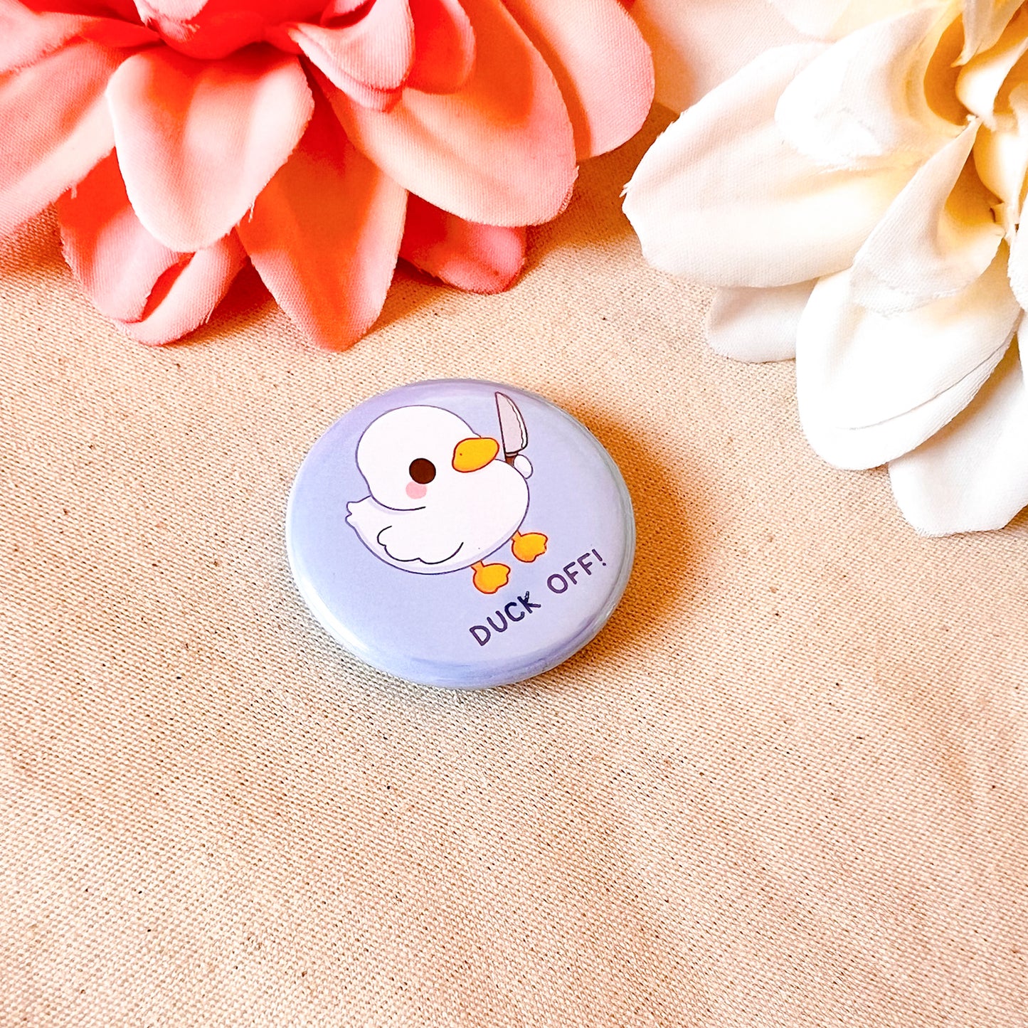 Ente mit Messer Button