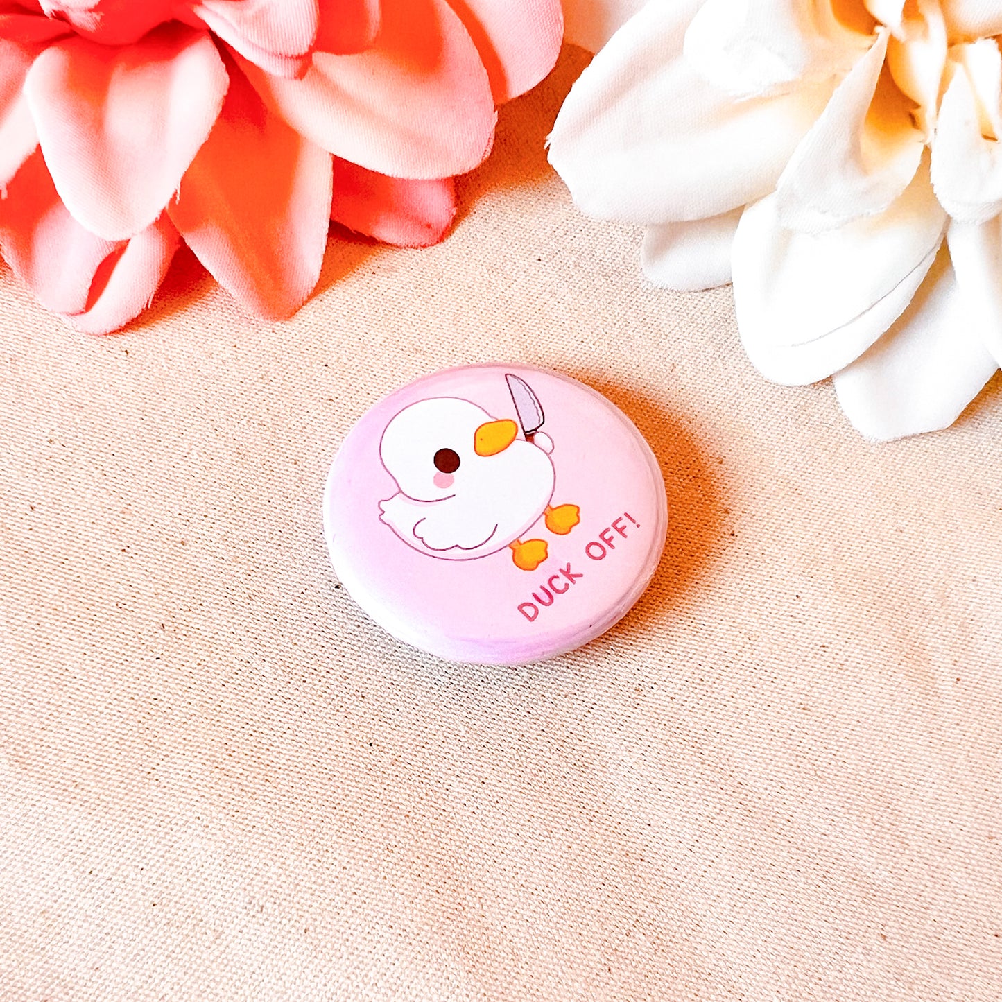 Ente mit Messer Button