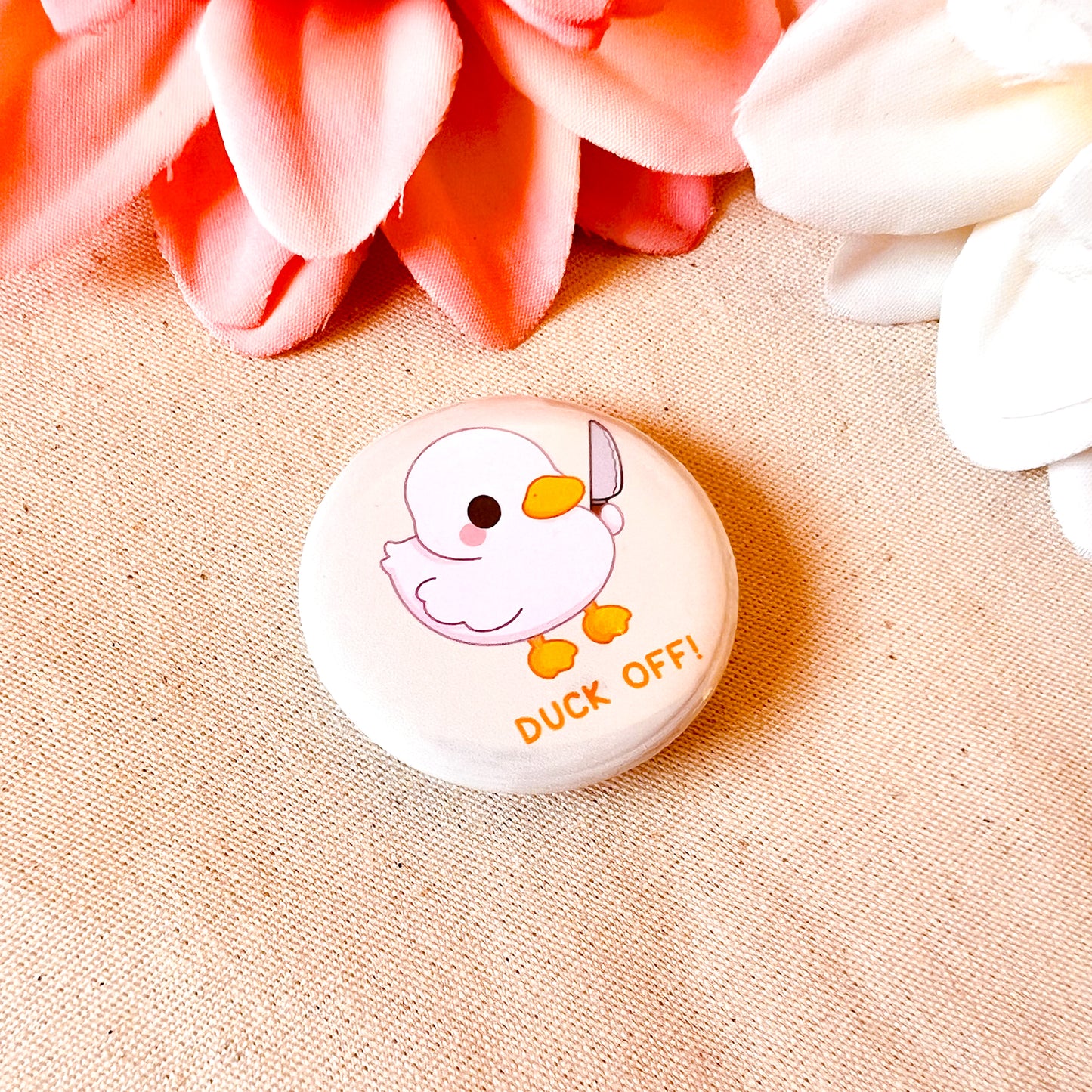 Ente mit Messer Button