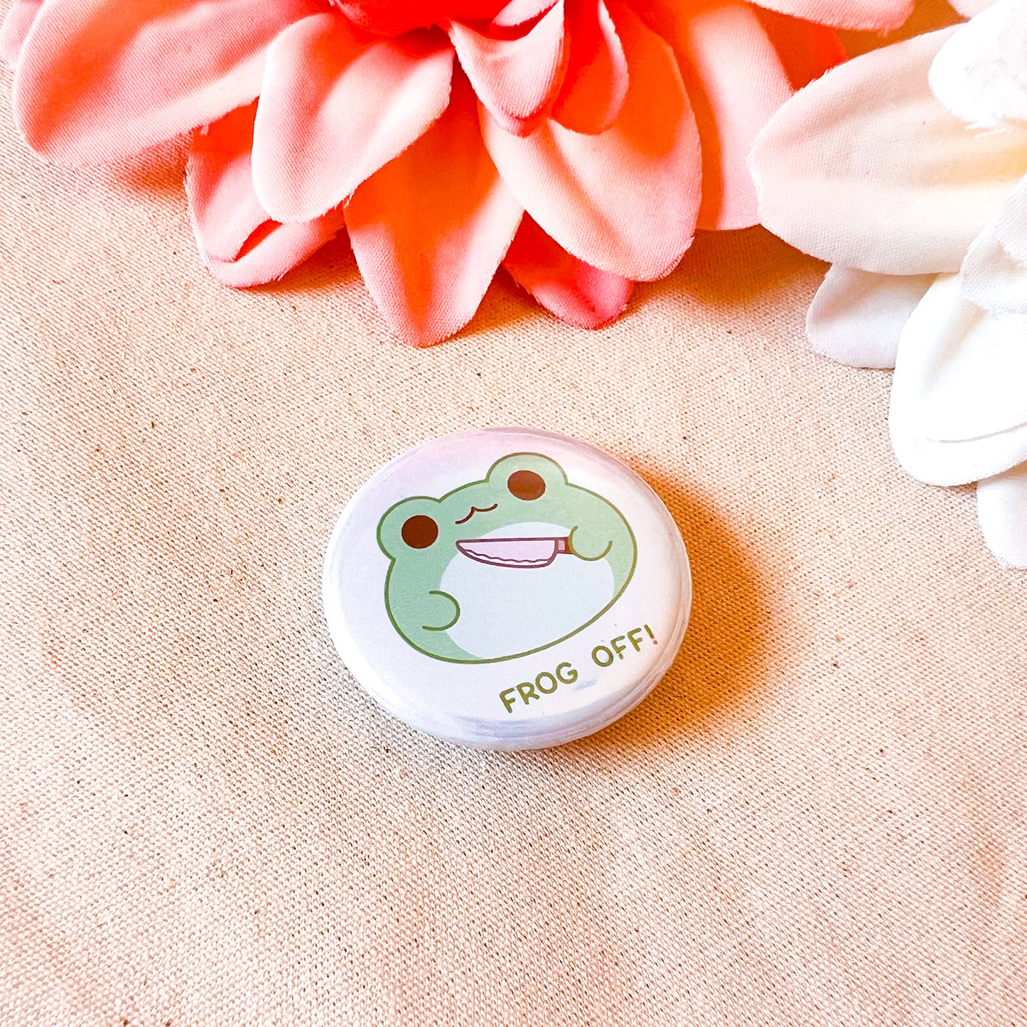 Frosch mit Messer Button