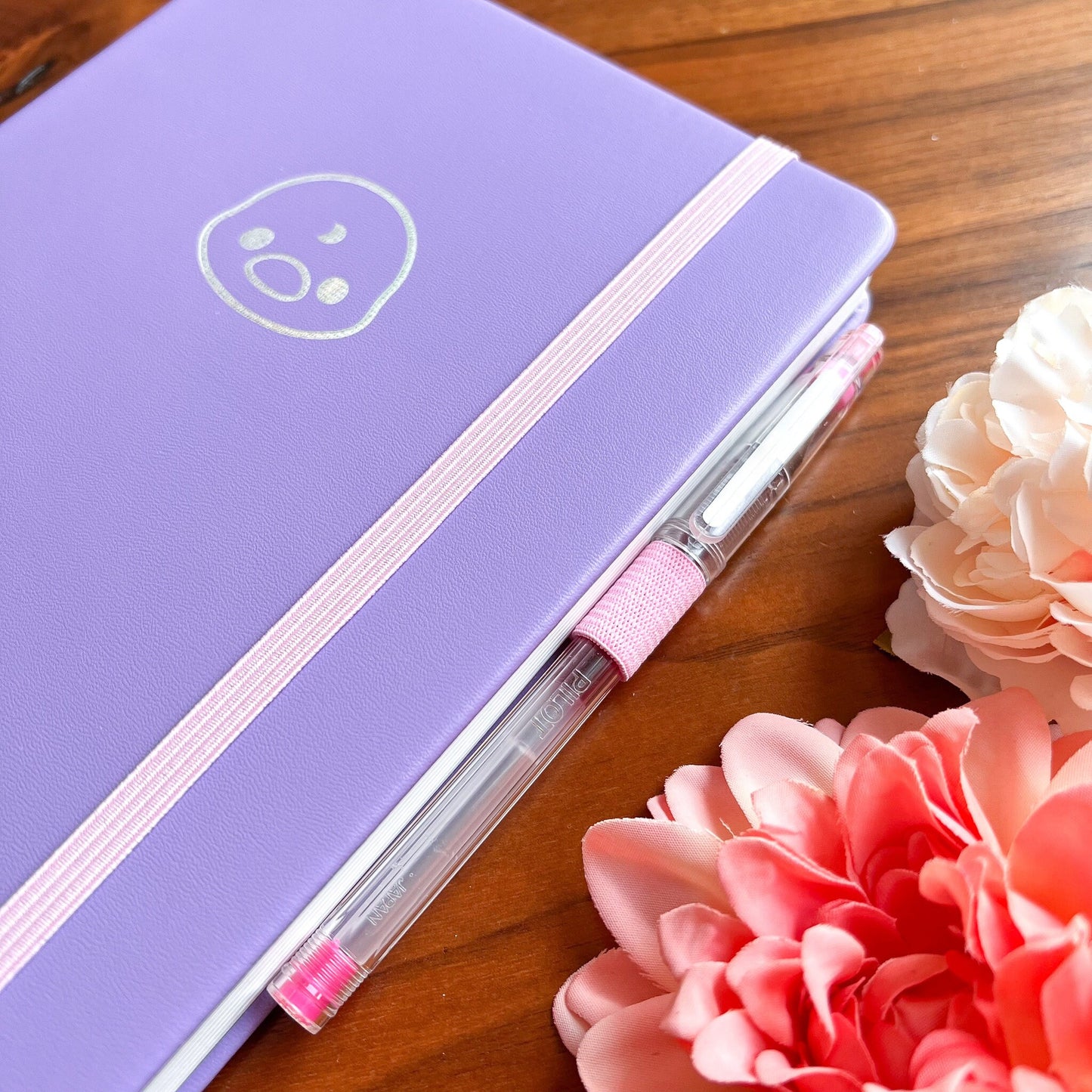 Lila Journal Buch mit Mond Ente