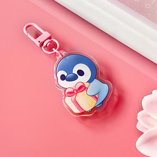 Pinguin mit Geschenk Schlüsselanhänger