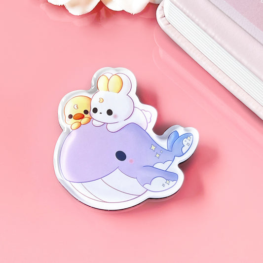 Hase und Ente fliegen auf dem Wal Magnet